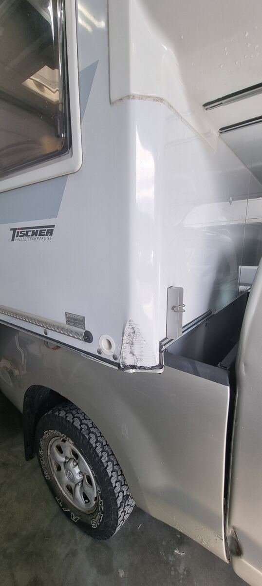 Coachbuilt motorhome body corner, before repair